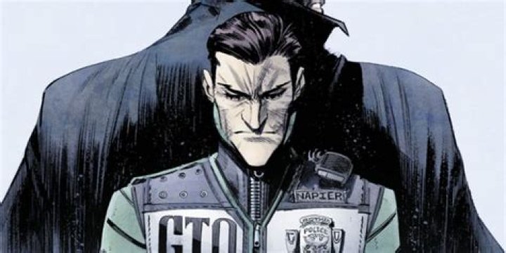 A cured Joker stands behind Batman.