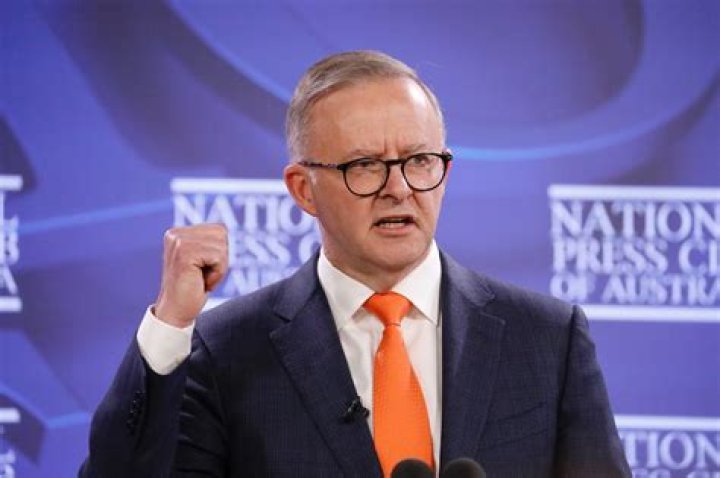 Anthony Albanese cuts a trim figure with girlfriend Jodie Haydon on arrival in Spain for the Nato Leaders Summit on June 27