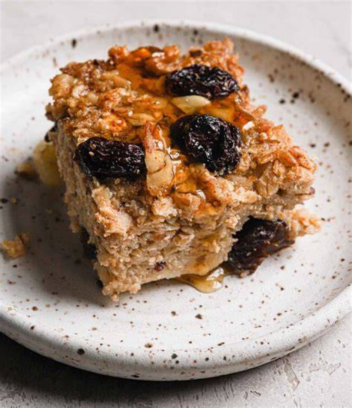Baked oatmeal cup with raisins and chocolate.