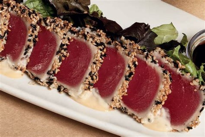 bonefish grill ahi tuna sashimi on a plate with garnish