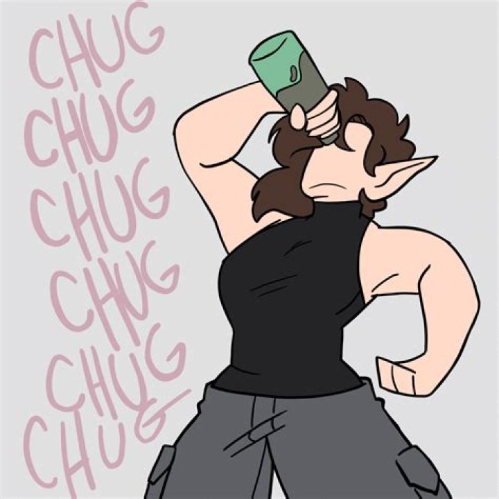 Chug, chug, chug: A young reveler is seen pouring a can of beer down his friend\'s throat in the middle of the crowd