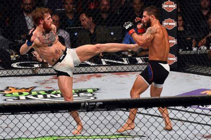 Conor McGregor kicks out at Dustin Poirier in a fiery press conference this week