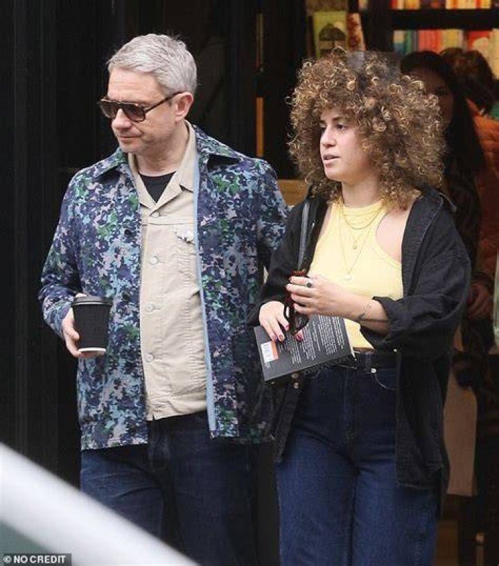 Coupled-up: Martin Freeman, 50, looked dapper in a blue suit at the Raindance Film Festival screening of Best Sellers with girlfriend&nbsp;Rachel Mariam, 29, in London on Wednesday