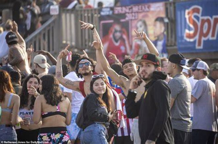 Covid US: Spring breakers ditch masks and social distancing rules on South Padre Island, Texas