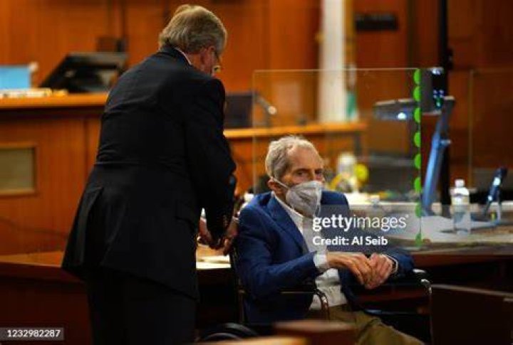 Durst, sitting in a wheelchair, was flanked by lawyers during the sentencing