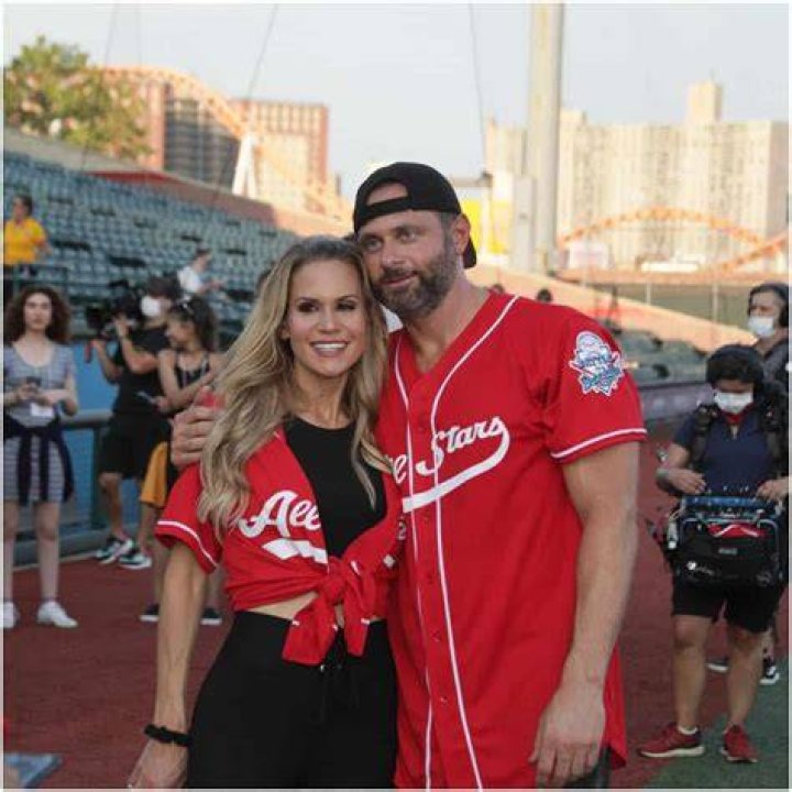 Evan Schneider and wife Jackie Schneider on the beach.