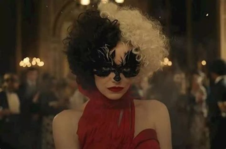 Iconic villain: Emma Stone is shown in a scene from Cruella that features costumes by Oscar-winning designer&nbsp;Jenny Beavan