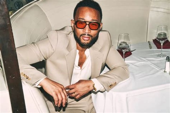 john legend with glass
