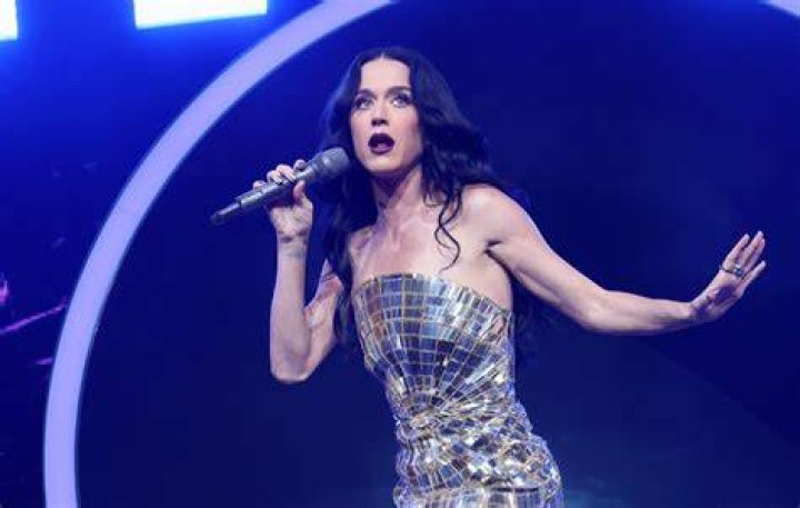 Katy Perry performs her first song on Saturday Night Live amid a group of mushrooms