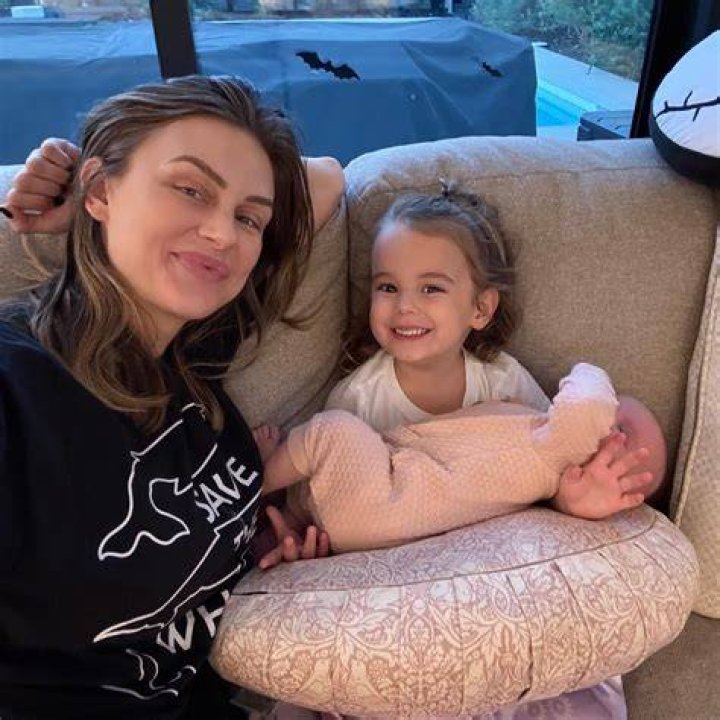 Lala Kent shows her strength as she cradles daughter Ocean during workout