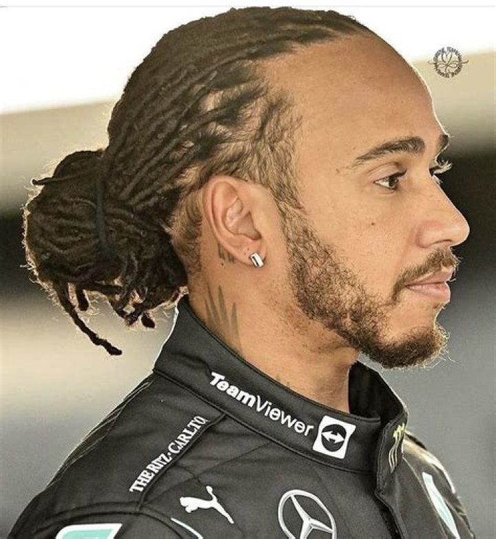 Lewis Hamilton (front right) locks up and flies off the track at Baku