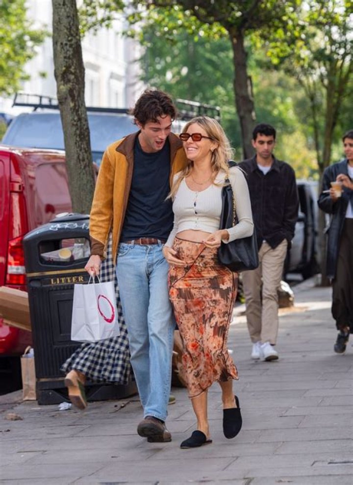 Maternity style: Sienna Miller, who is pregnant with her second child, proudly showed off her blossoming baby bump