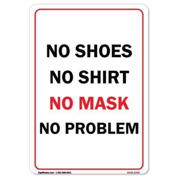 No mask, no problem! Advice from health officials fell on deaf ears as hardly any revelers were seen wearing protective face coverings or practicing social distancing on the crowded beach