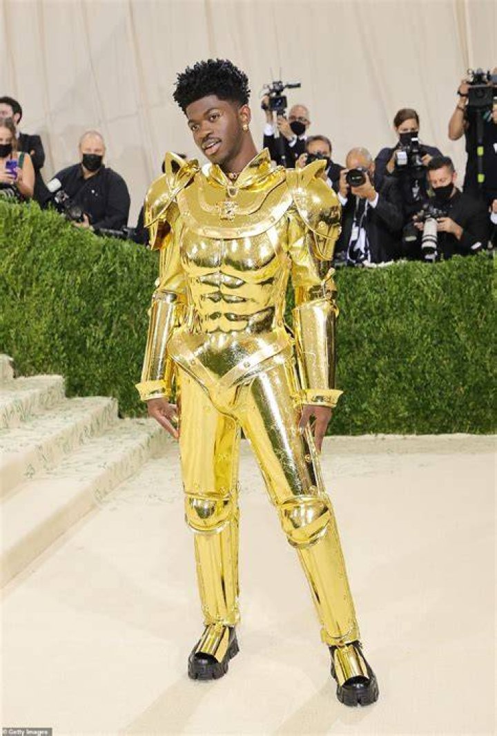 Robotic: The resemblance between Lil Nas X's gold Versace suit of armor and Star Wars robot C-3PO was also noted