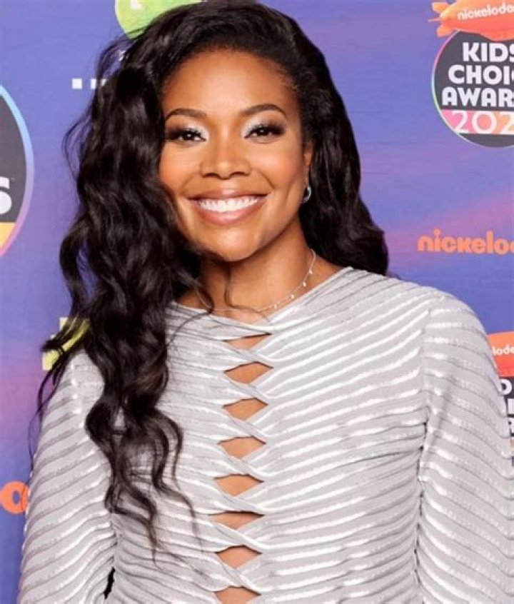 Rock solid: Gabrielle Union, 49, flaunted her fab figure in a pink-patterned bikini on Instagram, first in a post of two photos, and then again in the same two-piece in a video