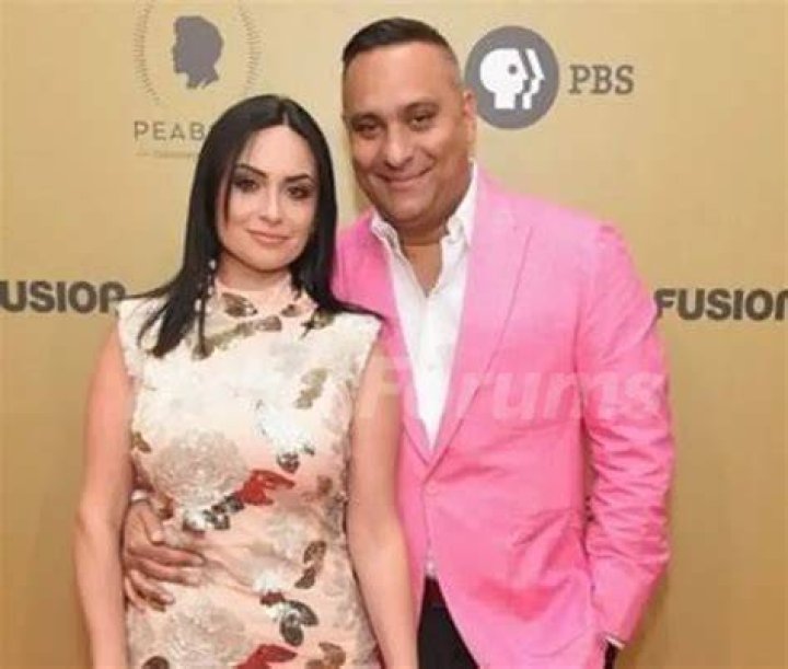 Russell Peters and Ruzanna Khetchian showing engagement ring
