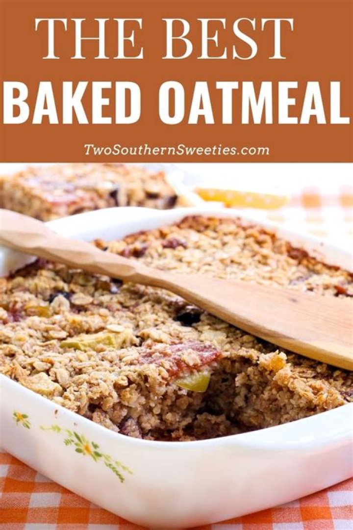 Stack of two baked oatmeal cups filled with chocolate chips.