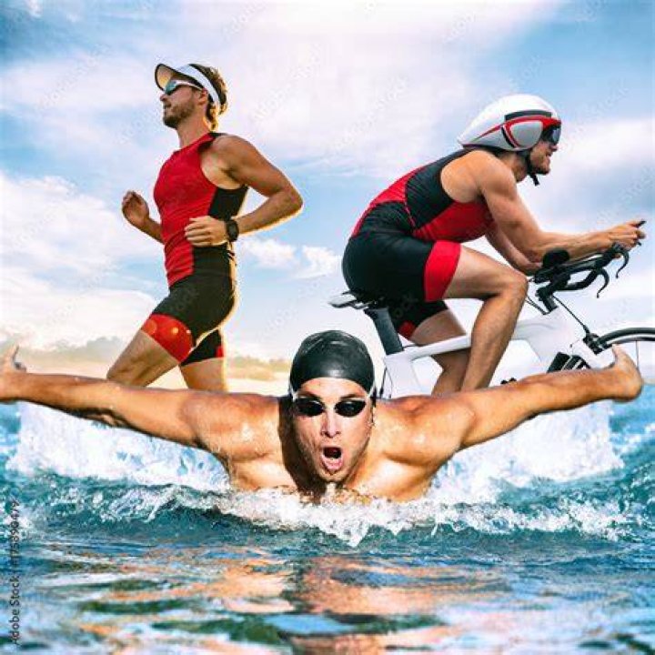 Triathlete's jump into water in Tokyo, Japan